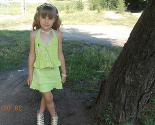 small girl in shorts