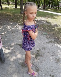 small girl in shorts